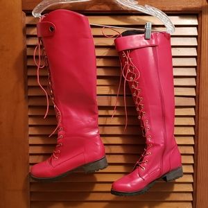 Red vinyl riding boots